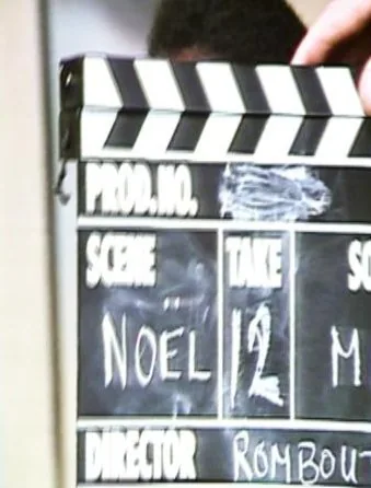 Clapperboard: scene Noël, take 12, director Rombout